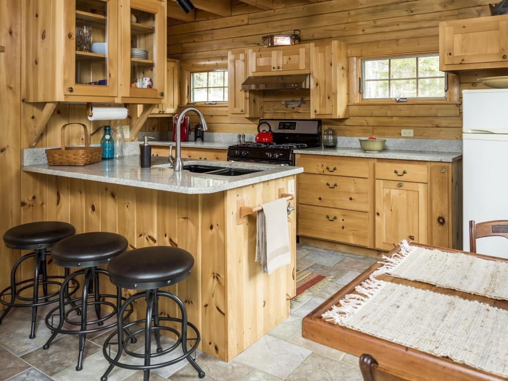 61 Breakneck Ridge Road Boothbay, ME 04571 - Photo 8 of 24 The galley kitchen with wood...