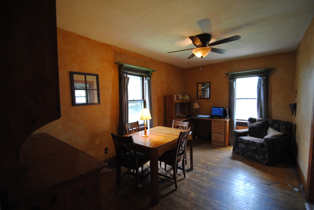 1120 Ridgeway Avenue Aurora, IL 60506 - Photo 7 of 16 a view of a livingroom with furniture and a window