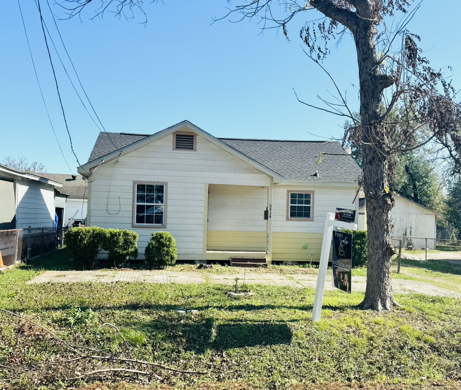 3414 Cochran Street Houston, TX 77009 - Photo 2 of 7 a front view of a house with garden