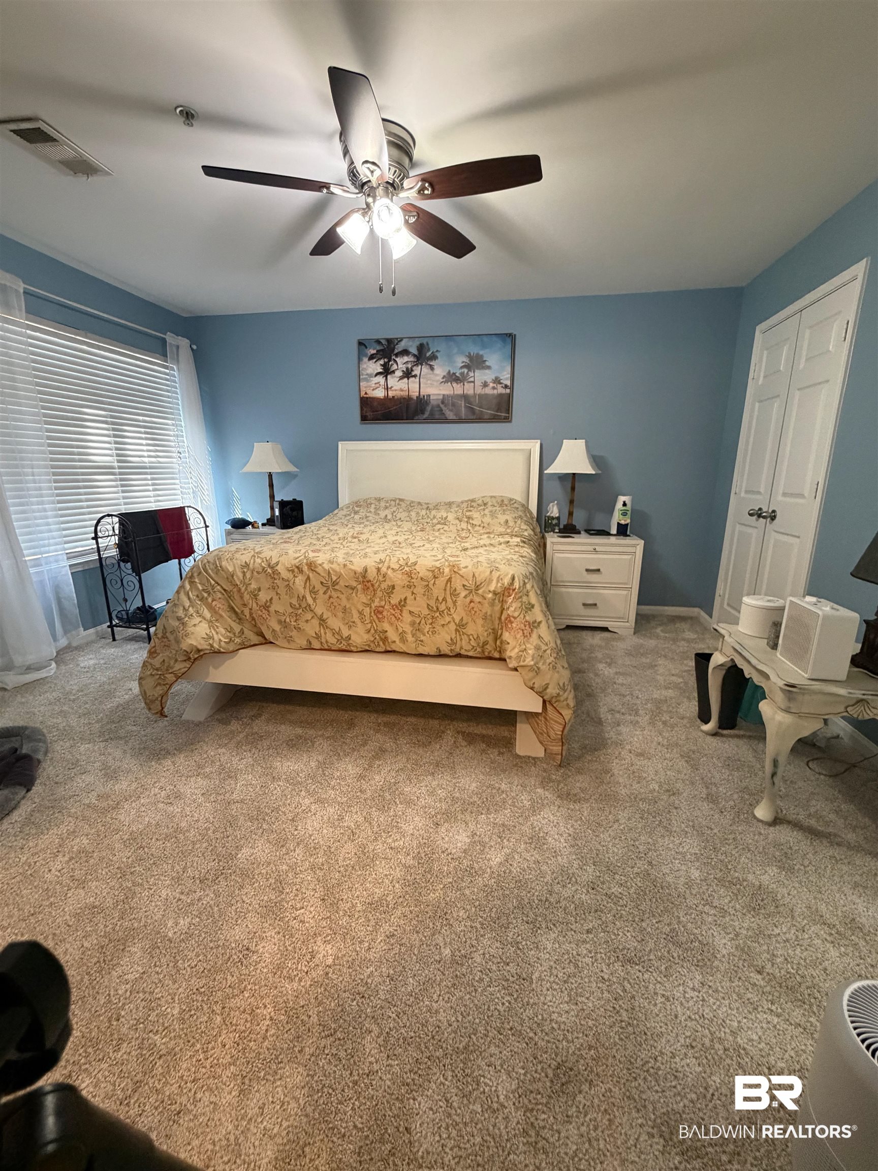 1517 Regency Road, Unit 71 Gulf Shores, AL 36542 - Photo 7 of 26 Carpeted bedroom featuring a ceiling fan