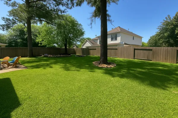 a view of a backyard with a small cabin