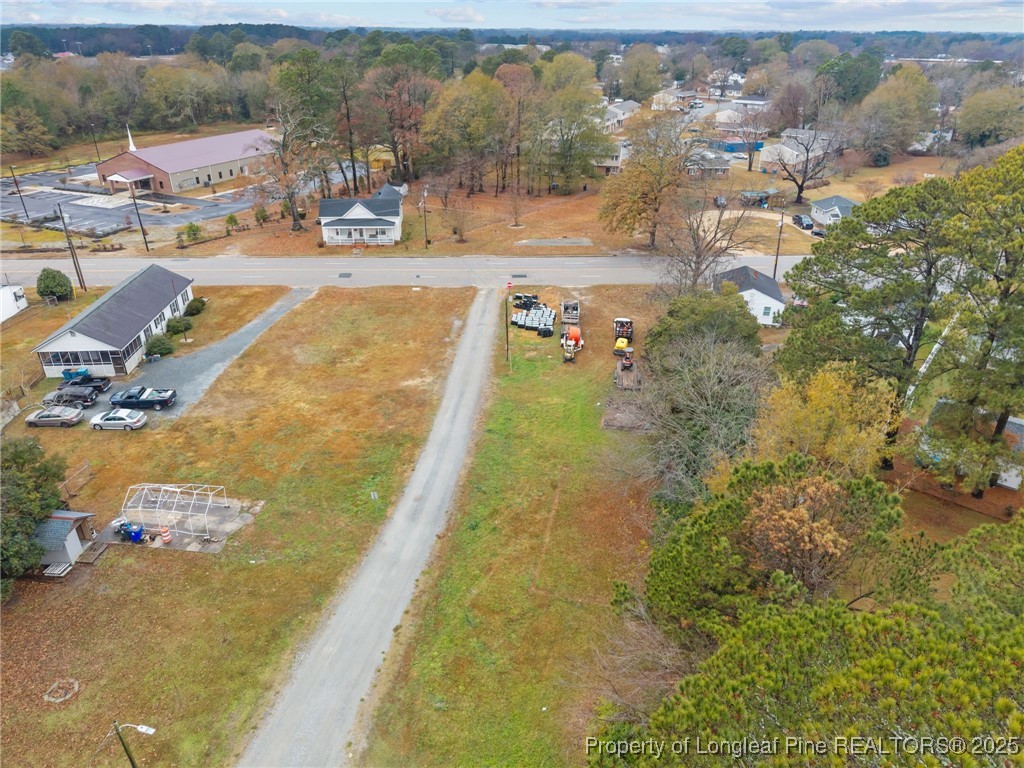 123-125 Spring Branch Road Dunn, NC 28334 - Photo 13 of 16 a view of swimming pool with a yard