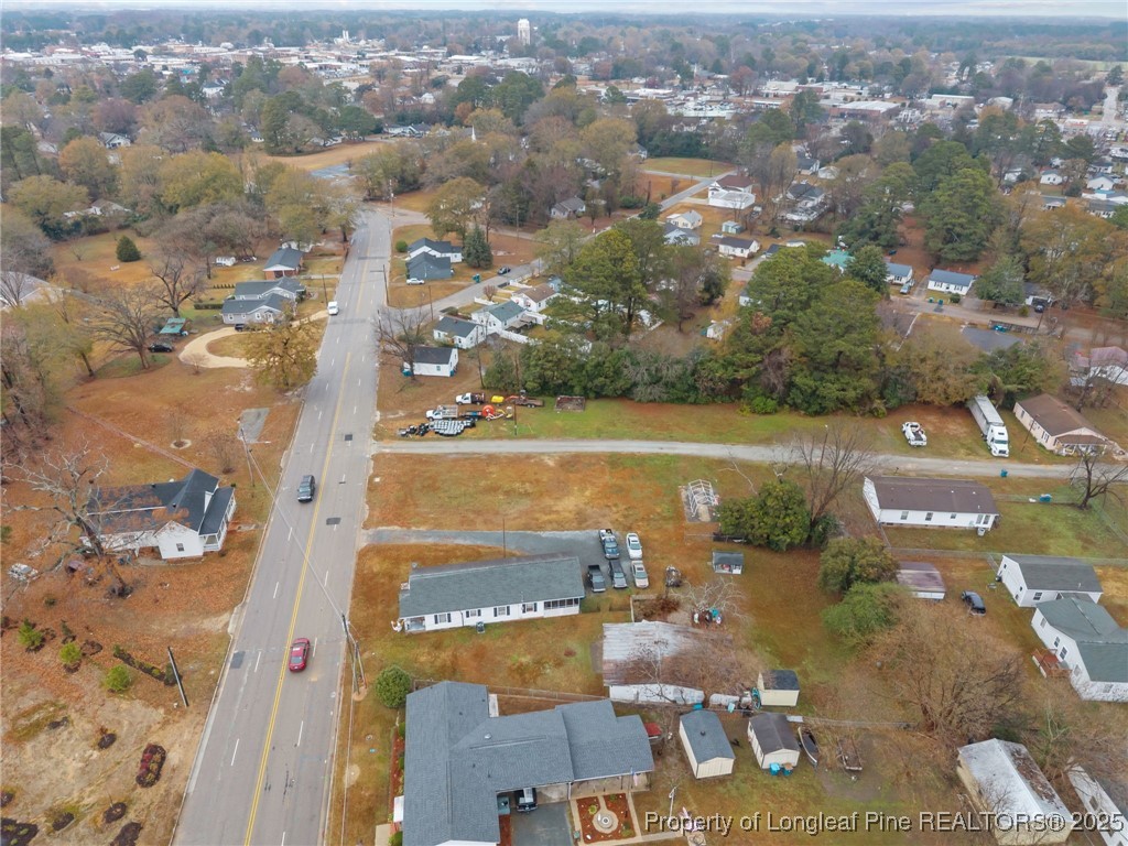 123-125 Spring Branch Road Dunn, NC 28334 - Photo 7 of 16 an aerial view of a city with lake view