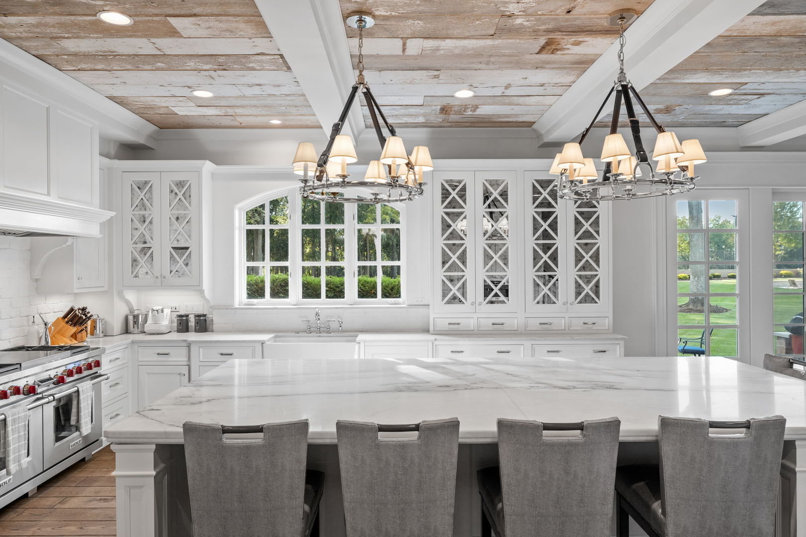 5021 Minkler Road Yorkville, IL 60560 - Photo 33 of 92 a kitchen with stainless steel appliances granite countertop a sink a stove and a wooden cabinets