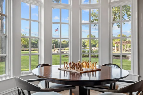 a open kitchen with stainless steel appliances granite countertop a stove and a sink