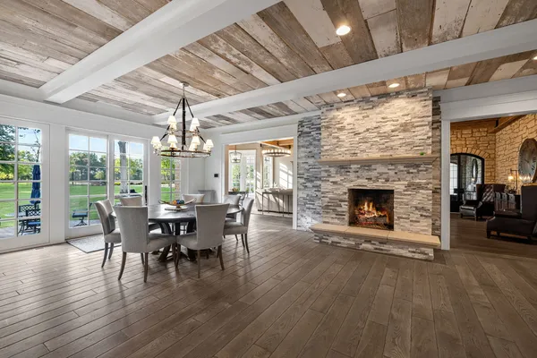 a living room with a couch and a wooden floor