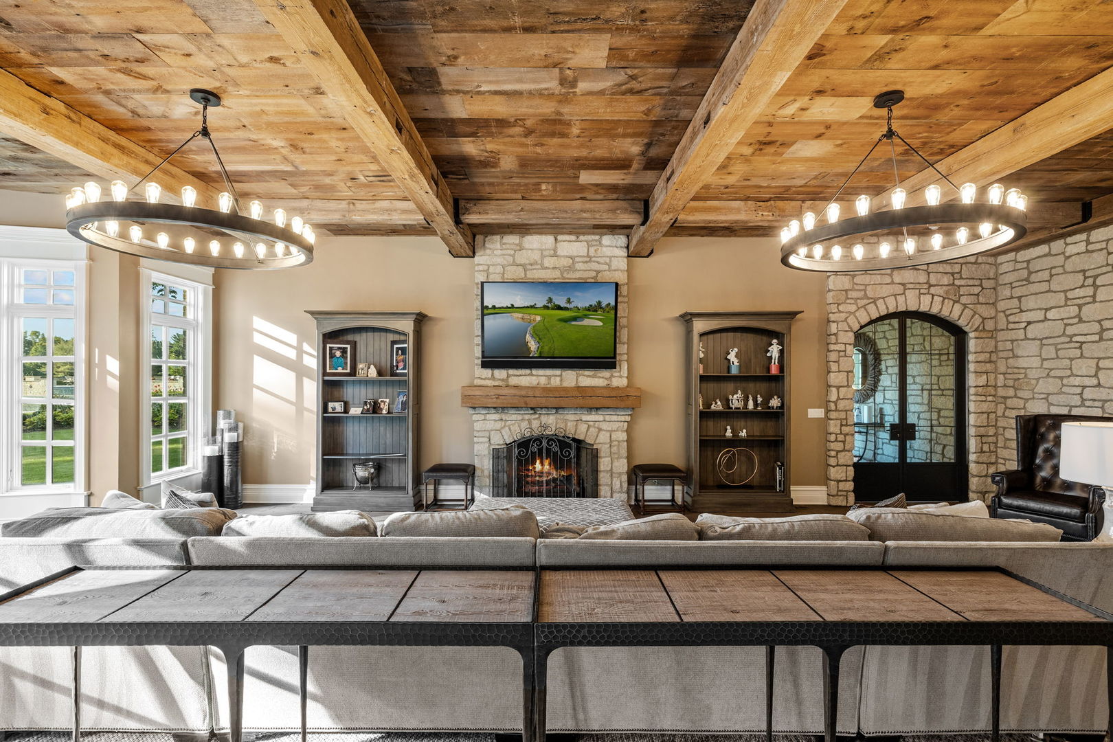 5021 Minkler Road Yorkville, IL 60560 - Photo 41 of 92 a living room with fireplace furniture and a chandelier