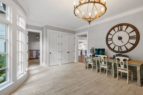 a view of an swimming pool and trees in the background