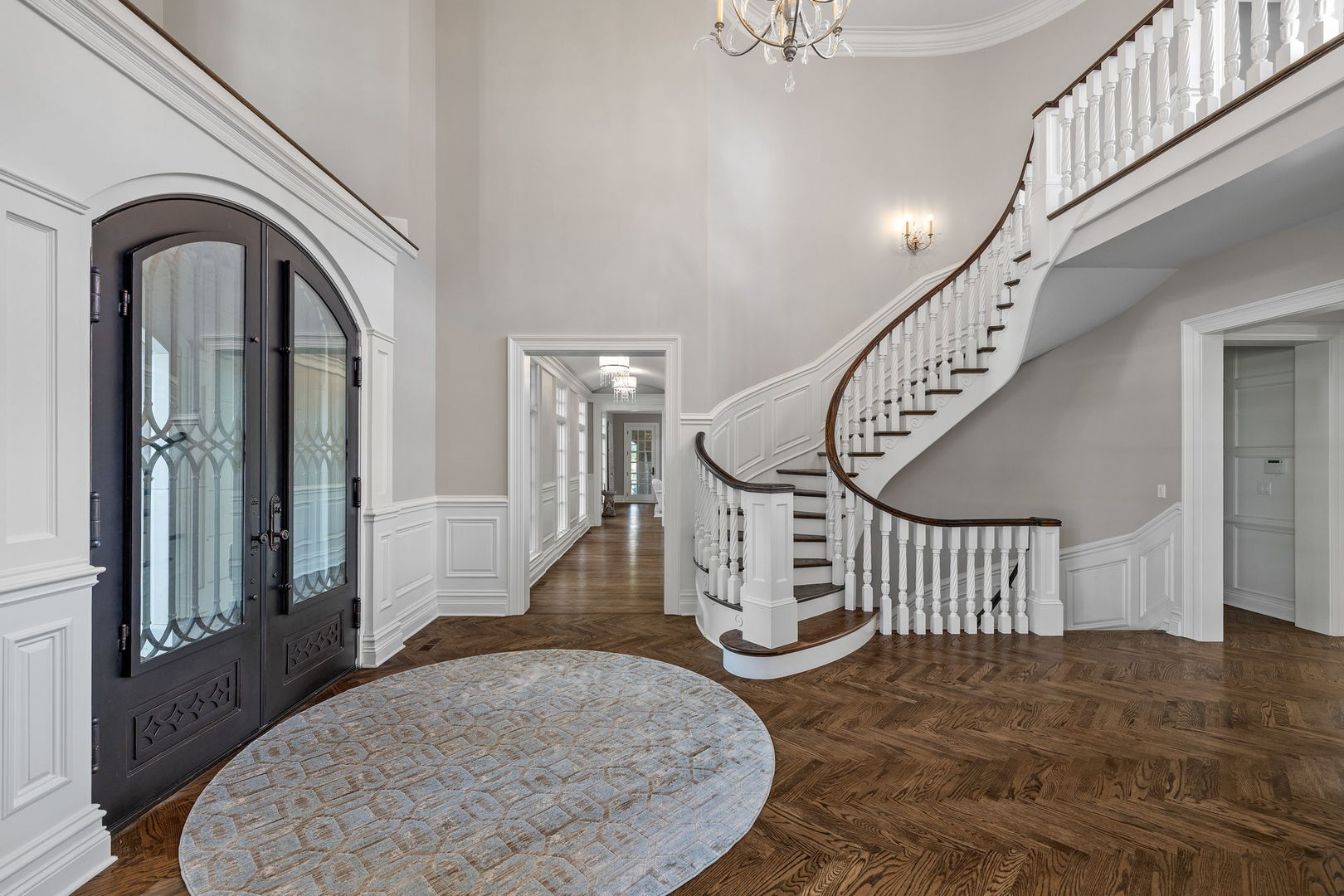 5021 Minkler Road Yorkville, IL 60560 - Photo 47 of 92 a view of staircase with lots of frames on wall and wooden floor