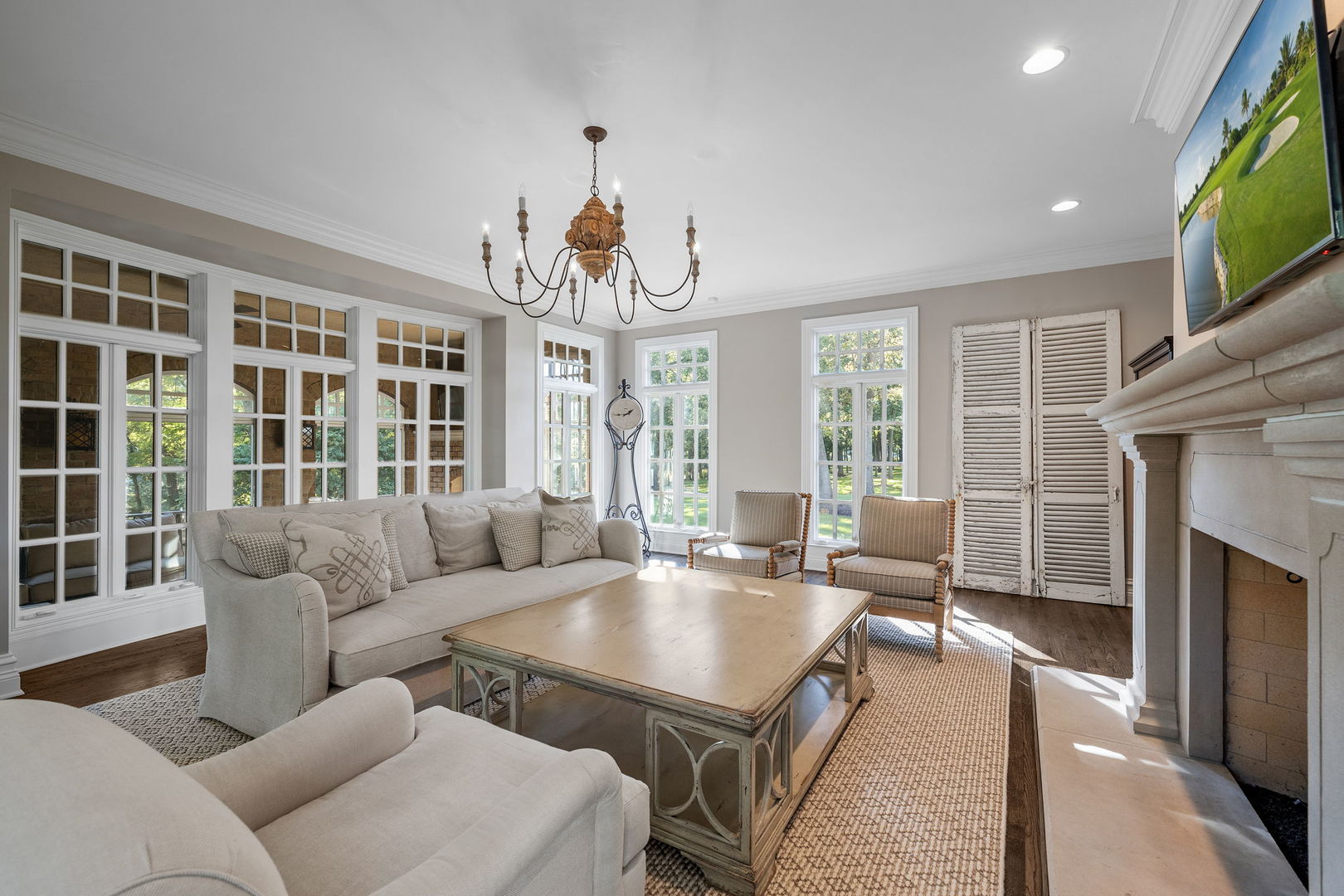5021 Minkler Road Yorkville, IL 60560 - Photo 50 of 92 a living room with furniture windows and a flat screen tv