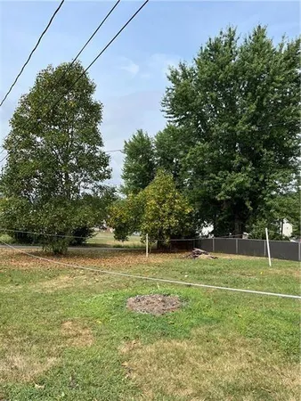 a view of a ground with a trees