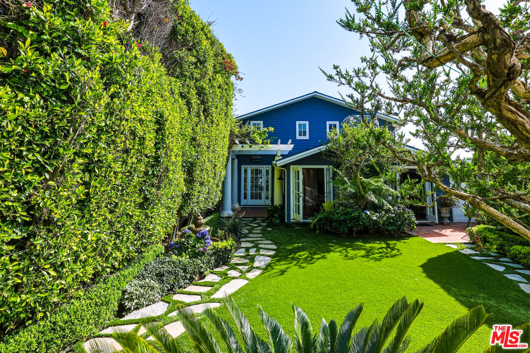 30810 Broad Beach Road Malibu, CA 90265 - Photo 9 of 55 a view of an house with backyard space and garden