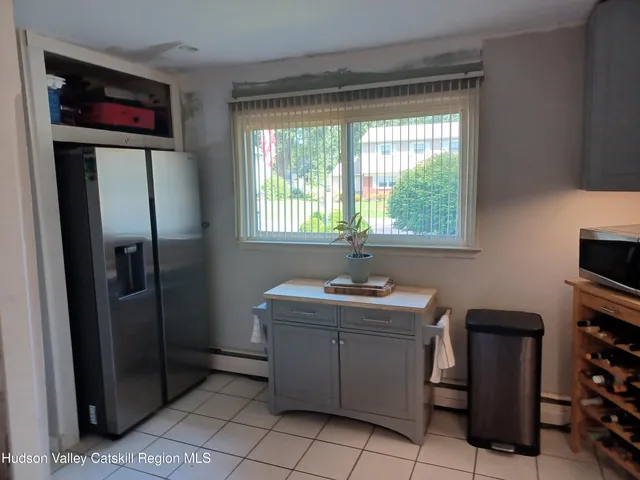 a room with cabinets a washer and dryer