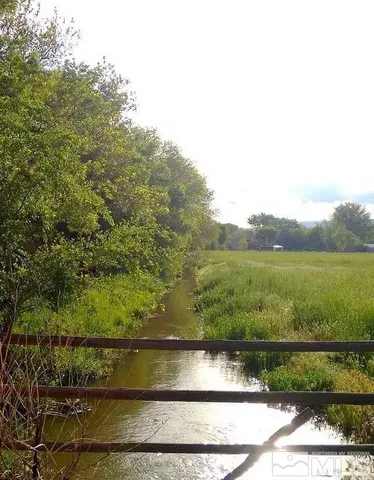 a view of a lake with a mountain