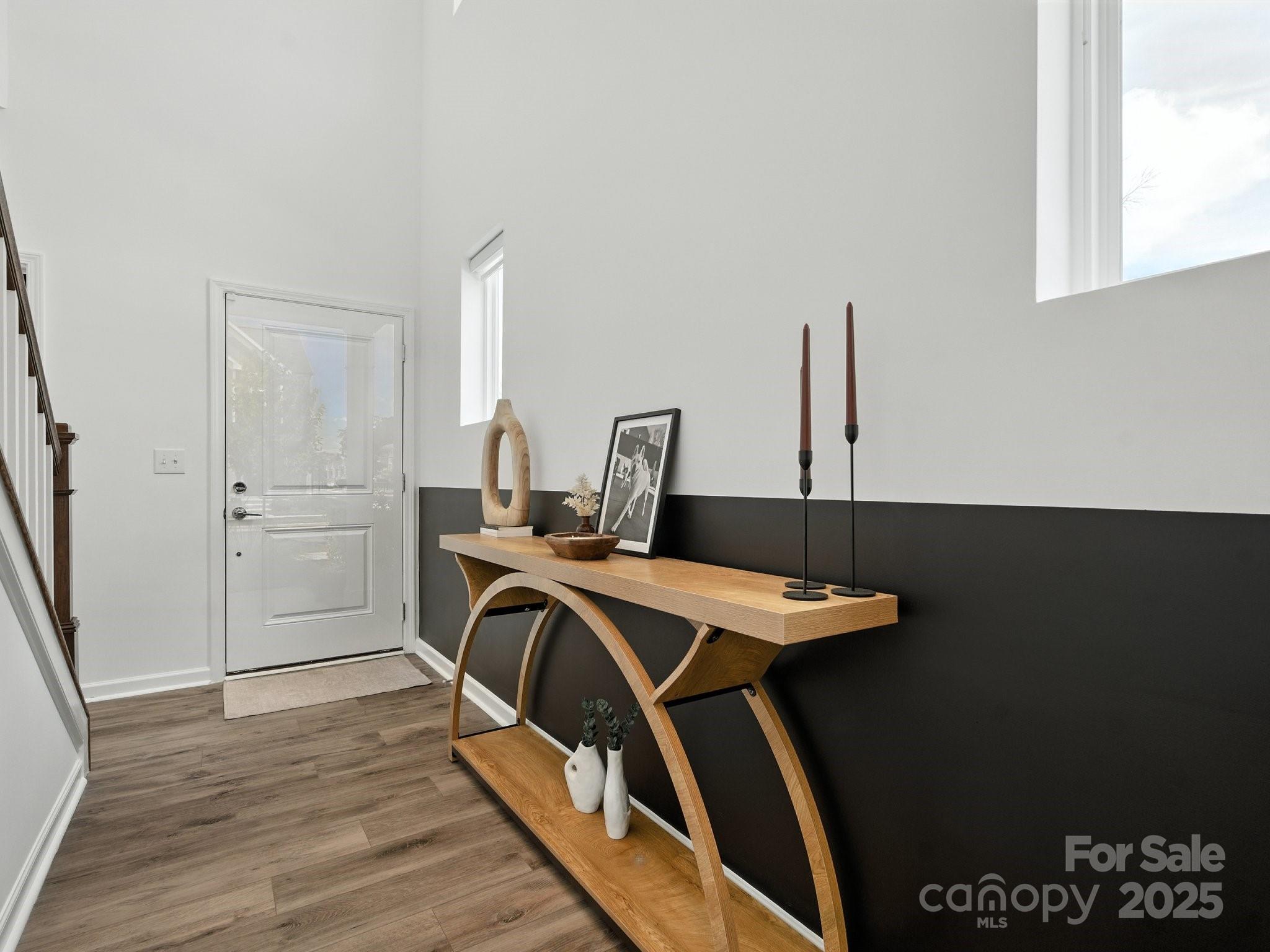 13156 Rover Street Charlotte, NC 28273 - Photo 3 of 37 a view of a kitchen with a sink cabinets and wooden floor