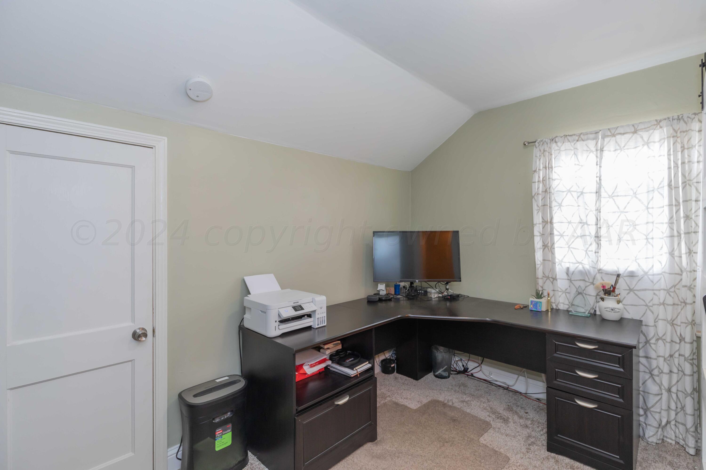 1007 South Alabama Street Amarillo, TX 79102 - Photo 29 of 55 a workspace with furniture and window