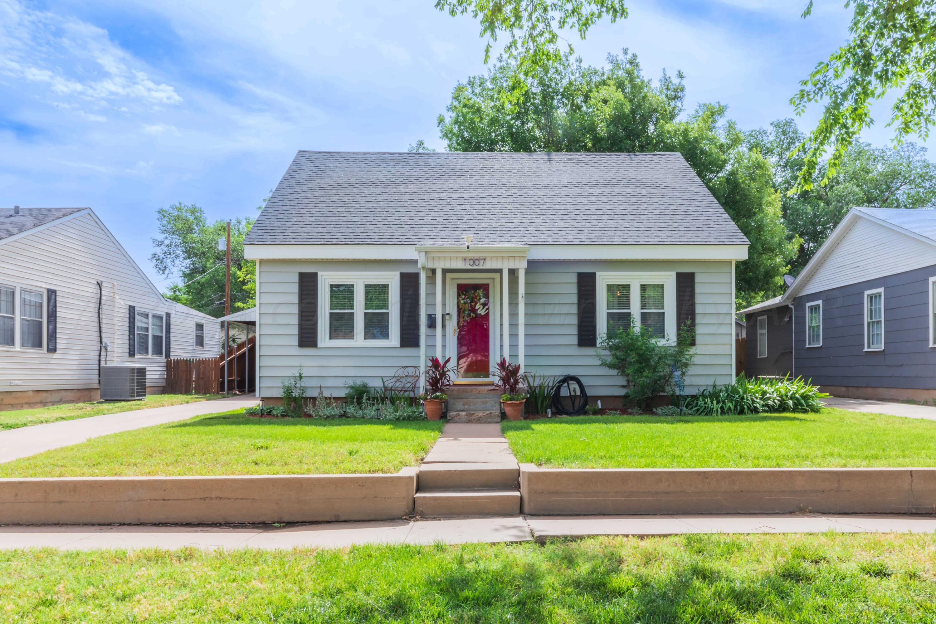 1007 South Alabama Street Amarillo, TX 79102 - Photo 3 of 55 a house with garden in front of it