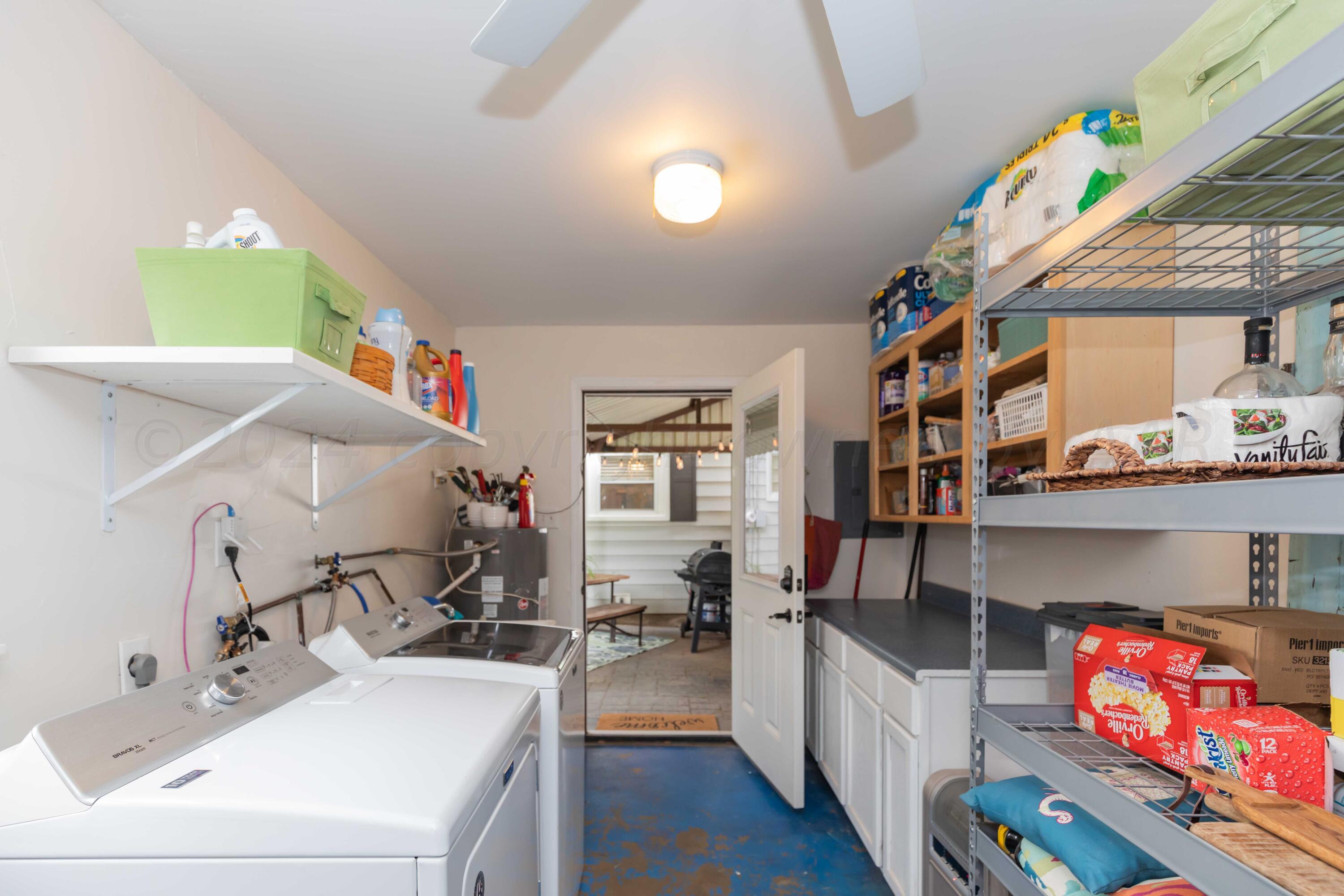 1007 South Alabama Street Amarillo, TX 79102 - Photo 36 of 55 a en suite bathroom with a sink and wooden floor