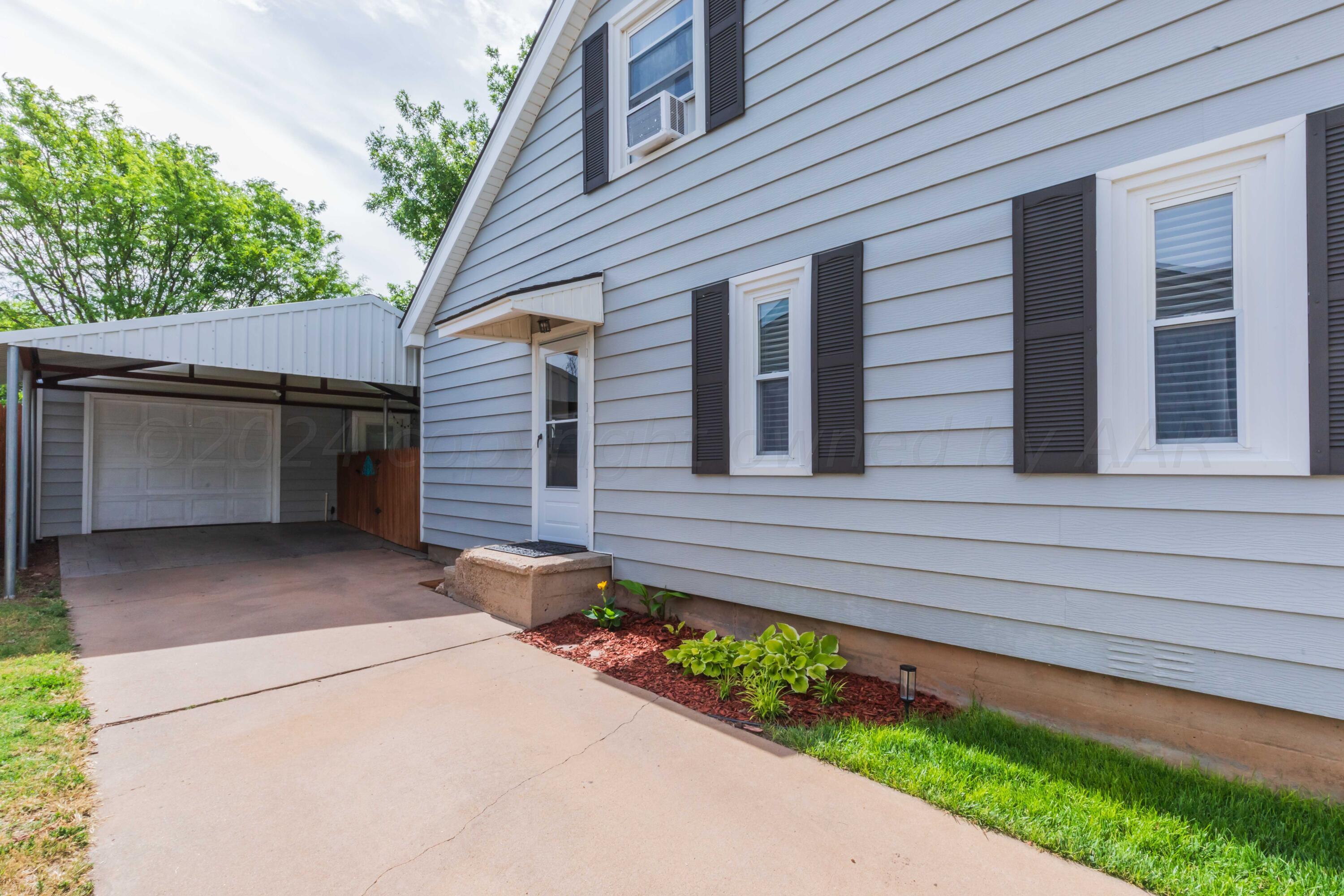 1007 South Alabama Street Amarillo, TX 79102 - Photo 38 of 55 a view of a house with a garage