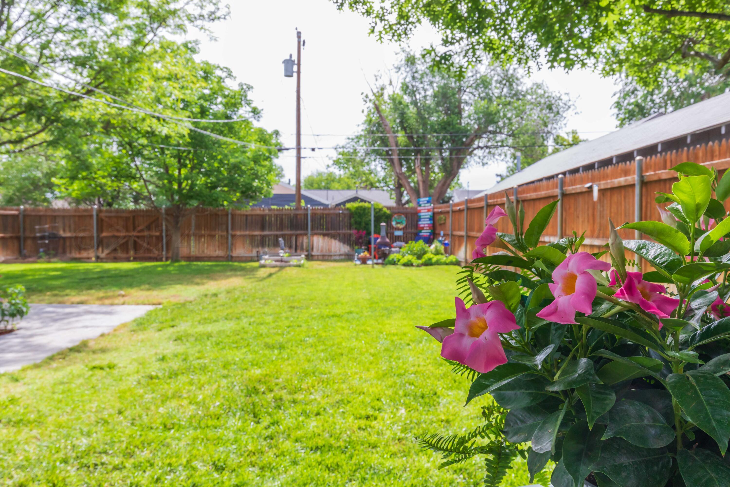 1007 South Alabama Street Amarillo, TX 79102 - Photo 39 of 55 a view of a house with a yard and sitting area