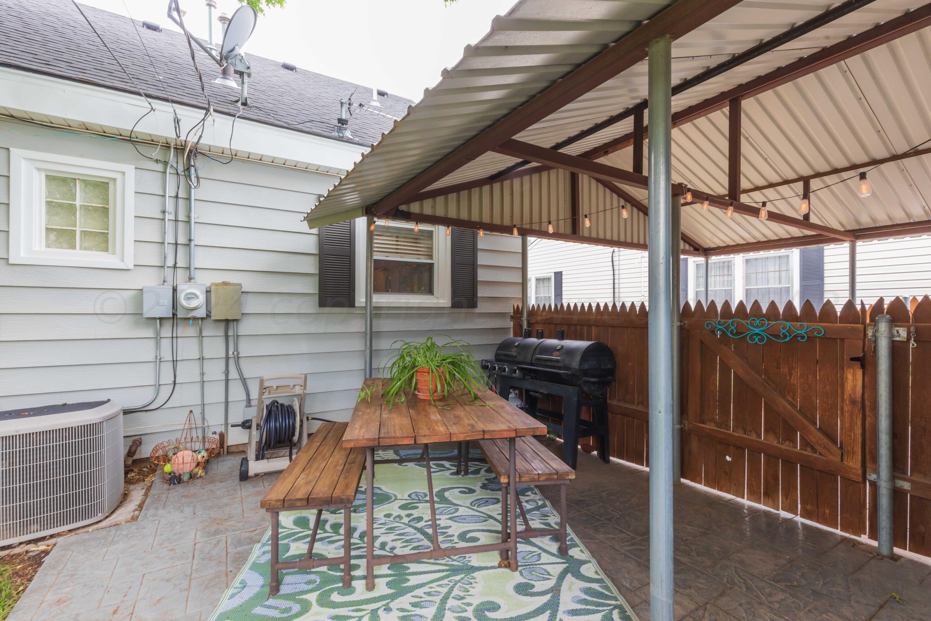 1007 South Alabama Street Amarillo, TX 79102 - Photo 44 of 55 a backyard of a house with seating space