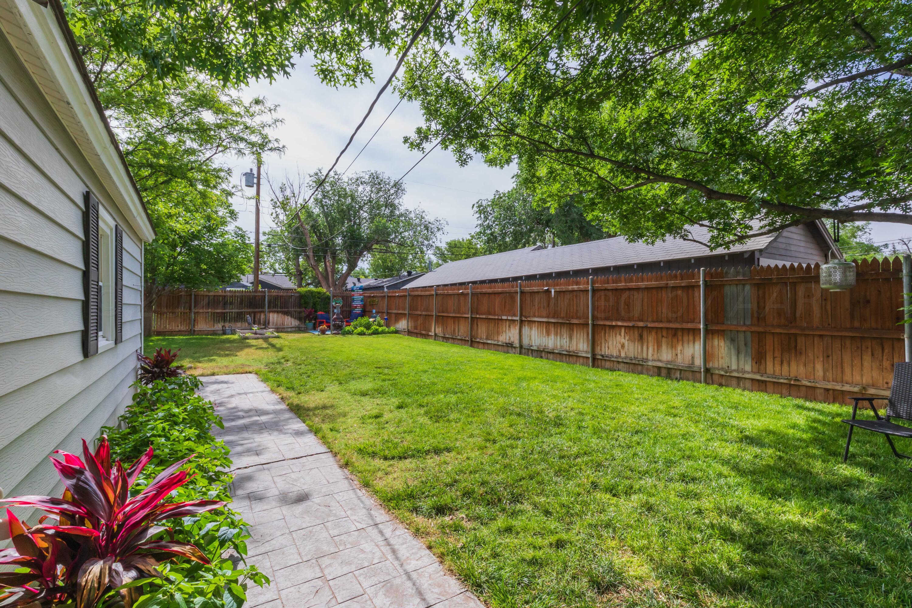 1007 South Alabama Street Amarillo, TX 79102 - Photo 46 of 55 a view of a backyard with a garden