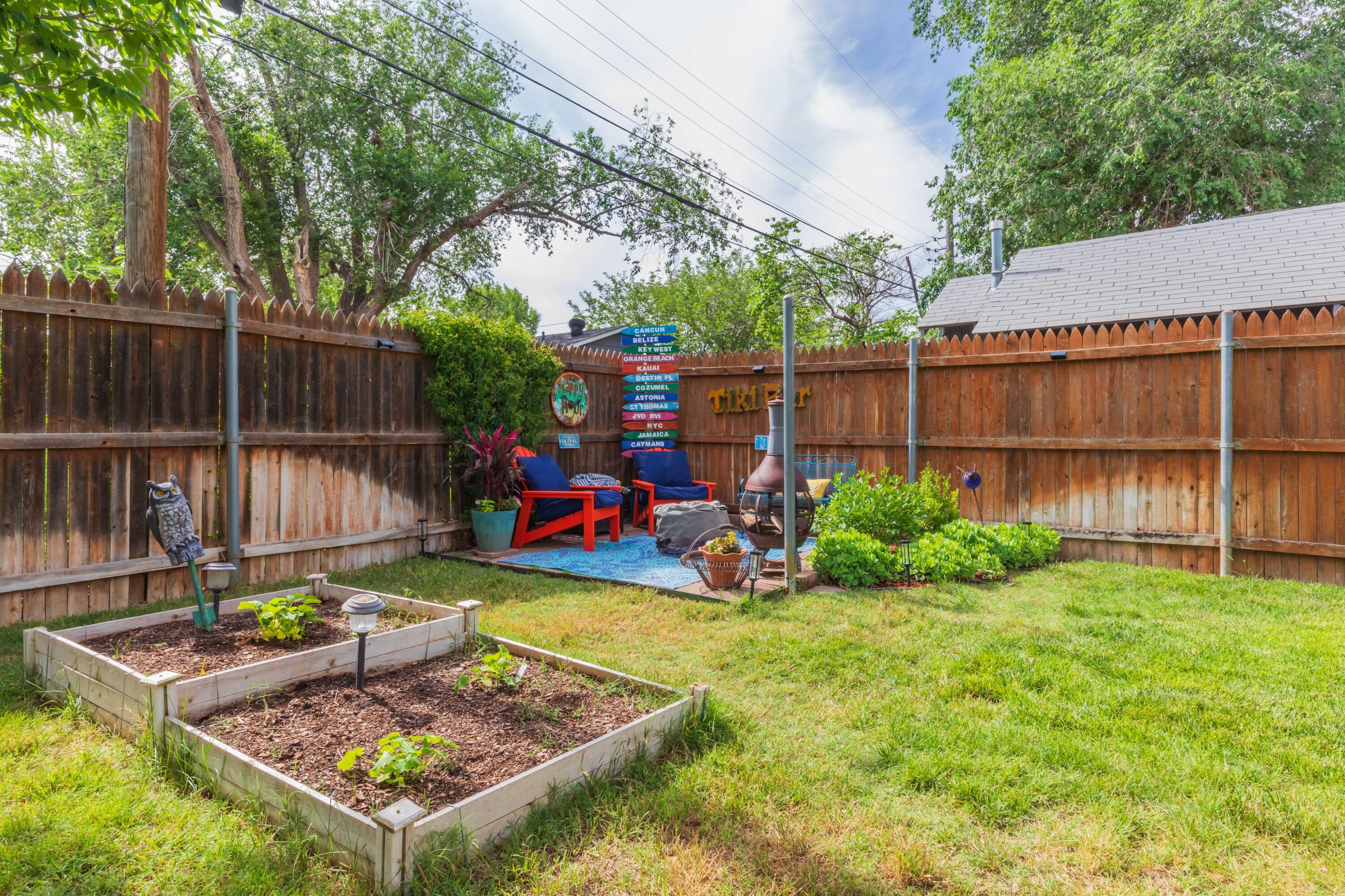 1007 South Alabama Street Amarillo, TX 79102 - Photo 47 of 55 a view of a backyard with plants and patio