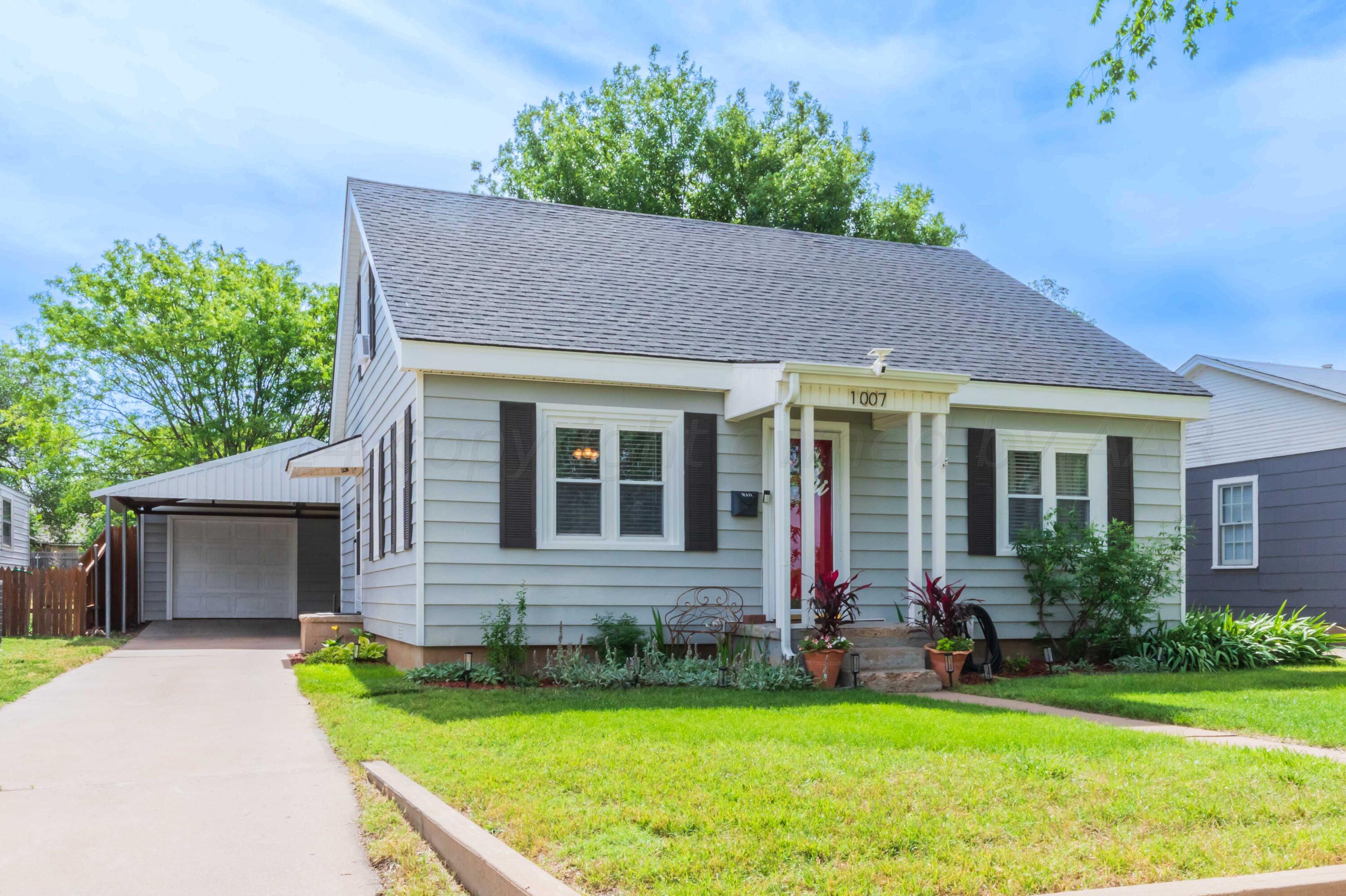 1007 South Alabama Street Amarillo, TX 79102 - Photo 5 of 55 a front view of house with yard and green space