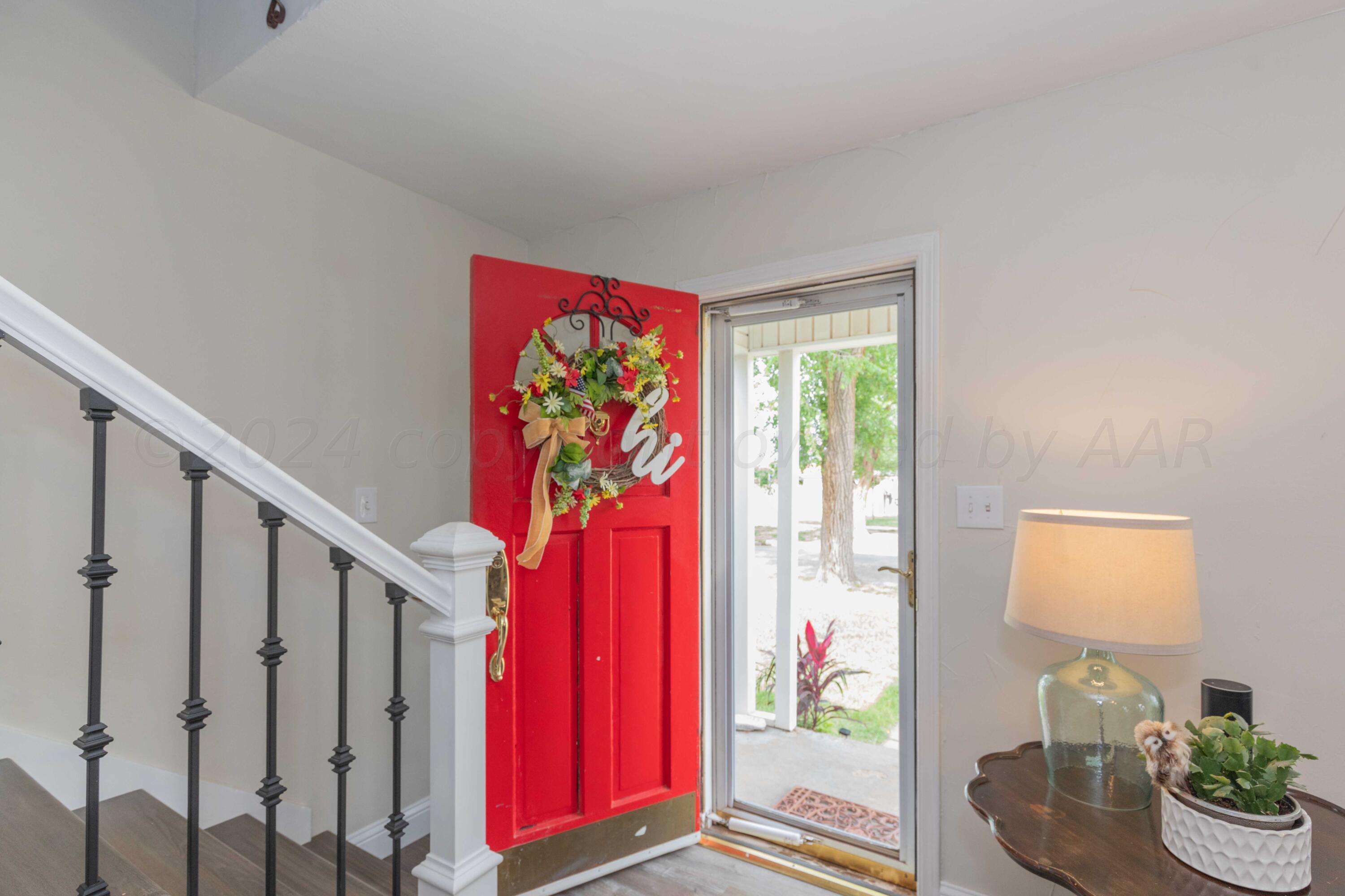 1007 South Alabama Street Amarillo, TX 79102 - Photo 7 of 55 a view of an entryway with wooden floor