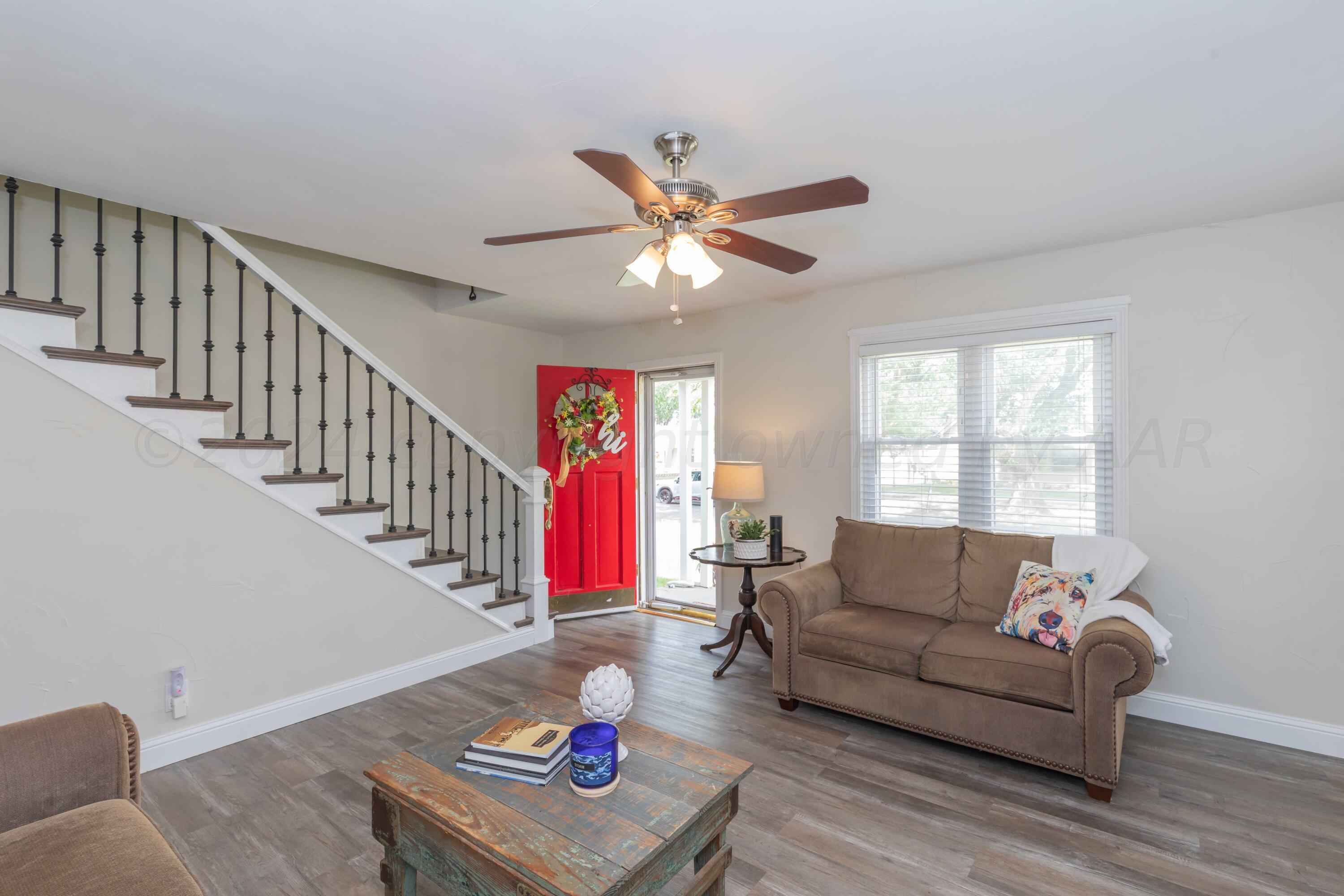 1007 South Alabama Street Amarillo, TX 79102 - Photo 8 of 55 a living room with furniture and a window