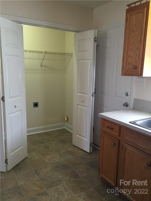 2296 Beth Haven Church Road, Unit 2296 Denver, NC 28037 - Photo 12 of 13 a bathroom with a sink and mirror