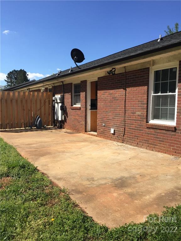 2296 Beth Haven Church Road, Unit 2296 Denver, NC 28037 - Photo 13 of 13 a front view of a house with a outdoor space