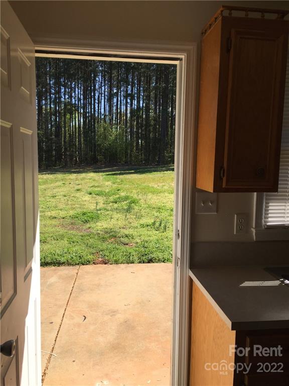 2296 Beth Haven Church Road, Unit 2296 Denver, NC 28037 - Photo 7 of 13 a bathroom with a sink and a large window