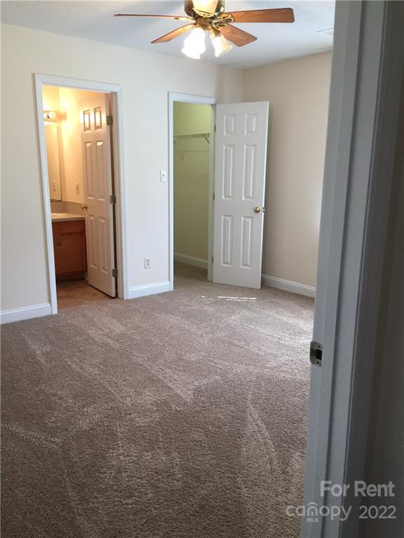 2296 Beth Haven Church Road, Unit 2296 Denver, NC 28037 - Photo 8 of 13 a view of an empty room with closet area
