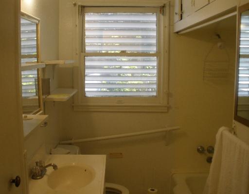 3618 Cypress Street Corpus Christi, TX 78411 - Photo 6 of 10 a bathroom with a sink and a shower