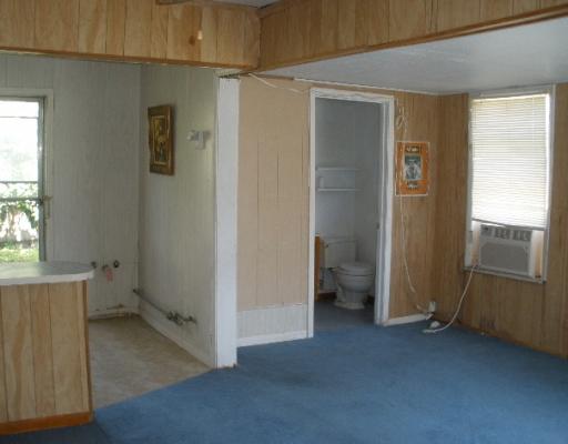 3618 Cypress Street Corpus Christi, TX 78411 - Photo 9 of 10 a view of an empty room with a window