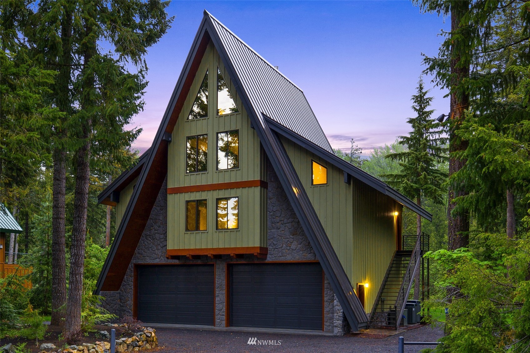 a view of a brick building with large windows