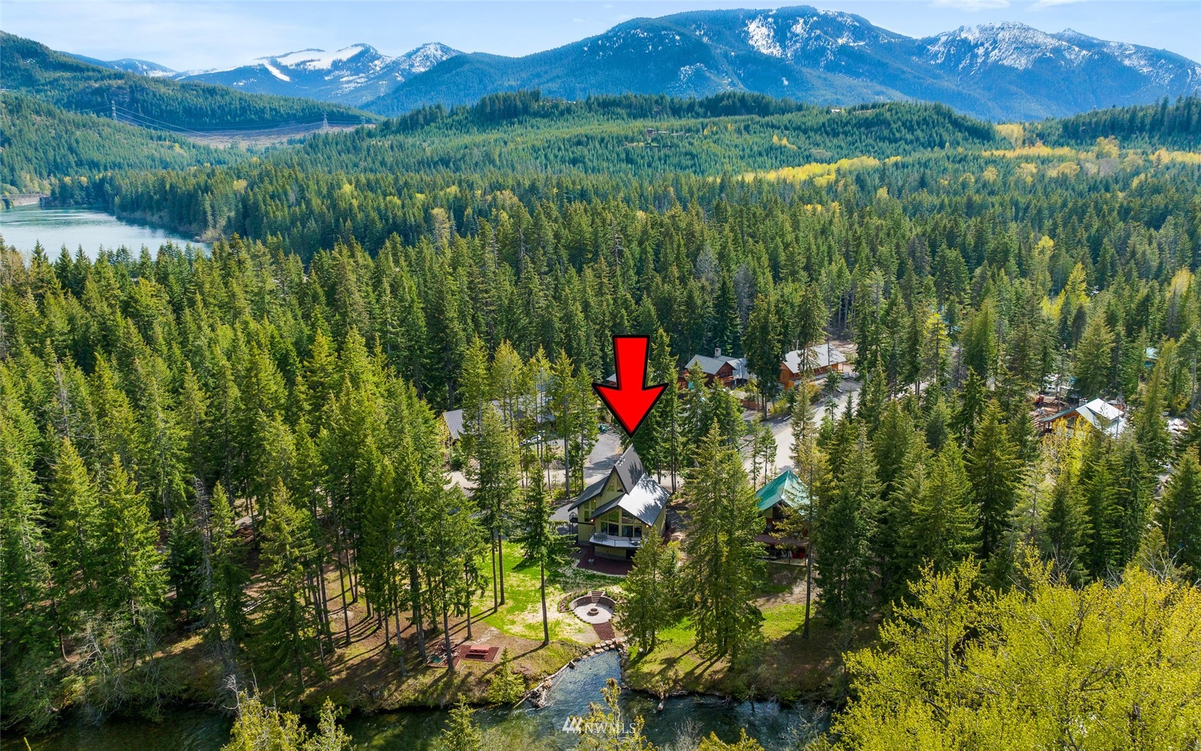 691 Kachess River Road Easton, WA 98925 - Photo 13 of 40 a view of a lush green forest with a mountain