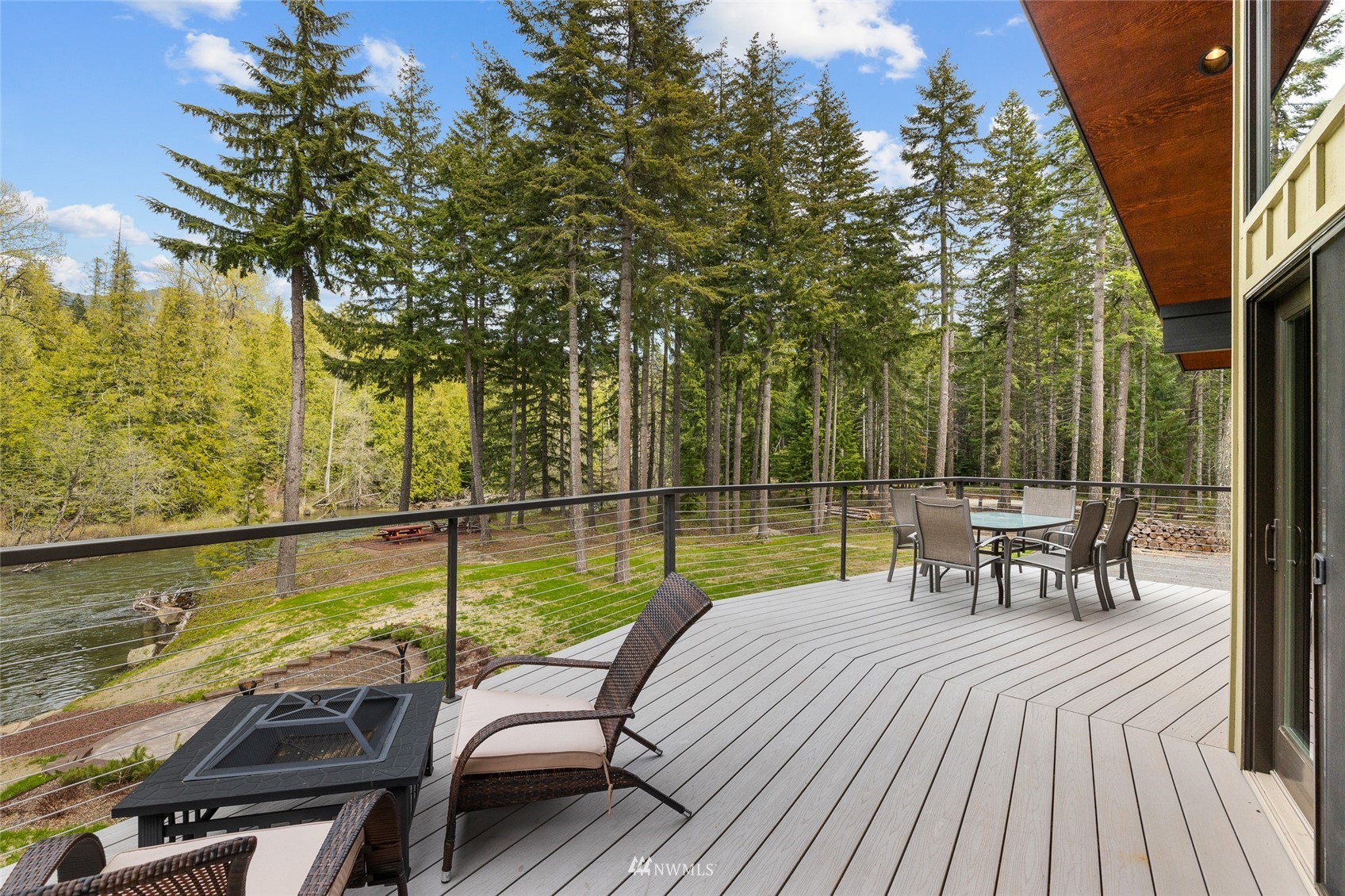 691 Kachess River Road Easton, WA 98925 - Photo 24 of 40 a view of a balcony with two chairs and a table