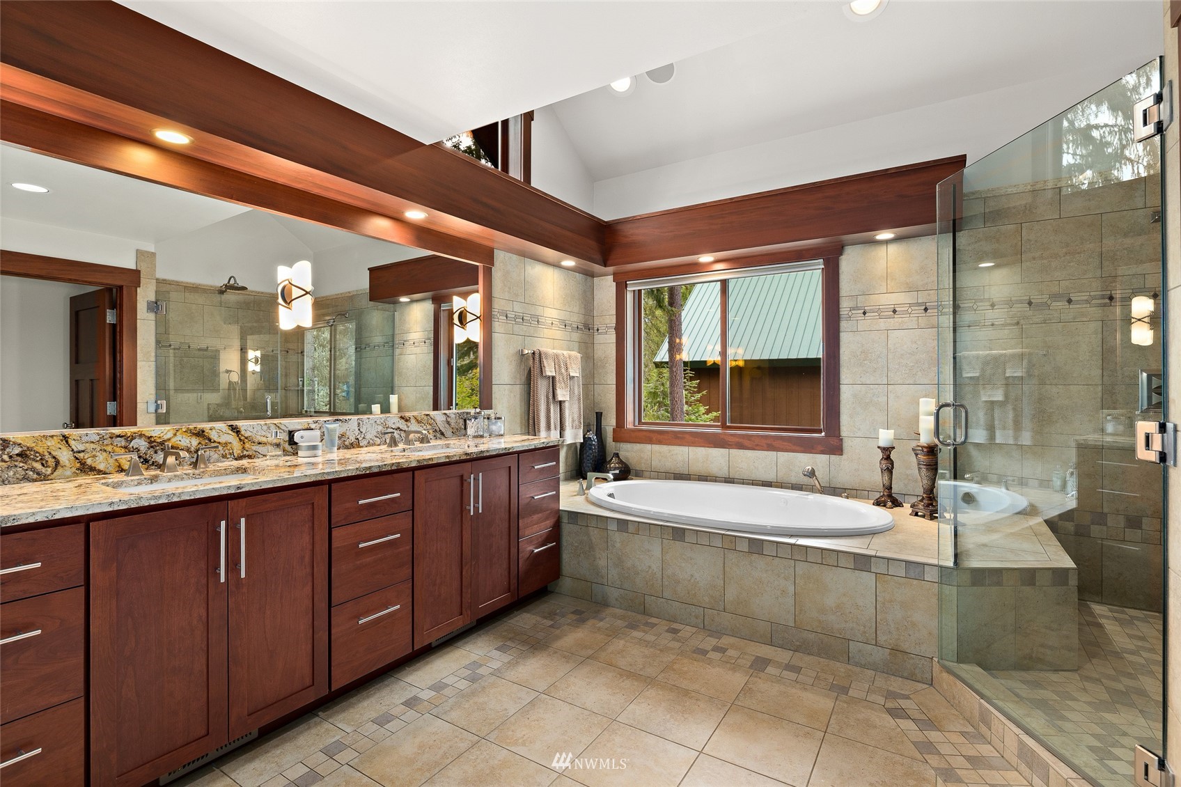 691 Kachess River Road Easton, WA 98925 - Photo 28 of 40 a spacious bathroom with a large tub shower and sink