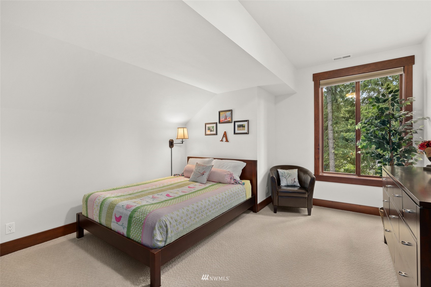 691 Kachess River Road Easton, WA 98925 - Photo 31 of 40 a bedroom with a bed chair and a window