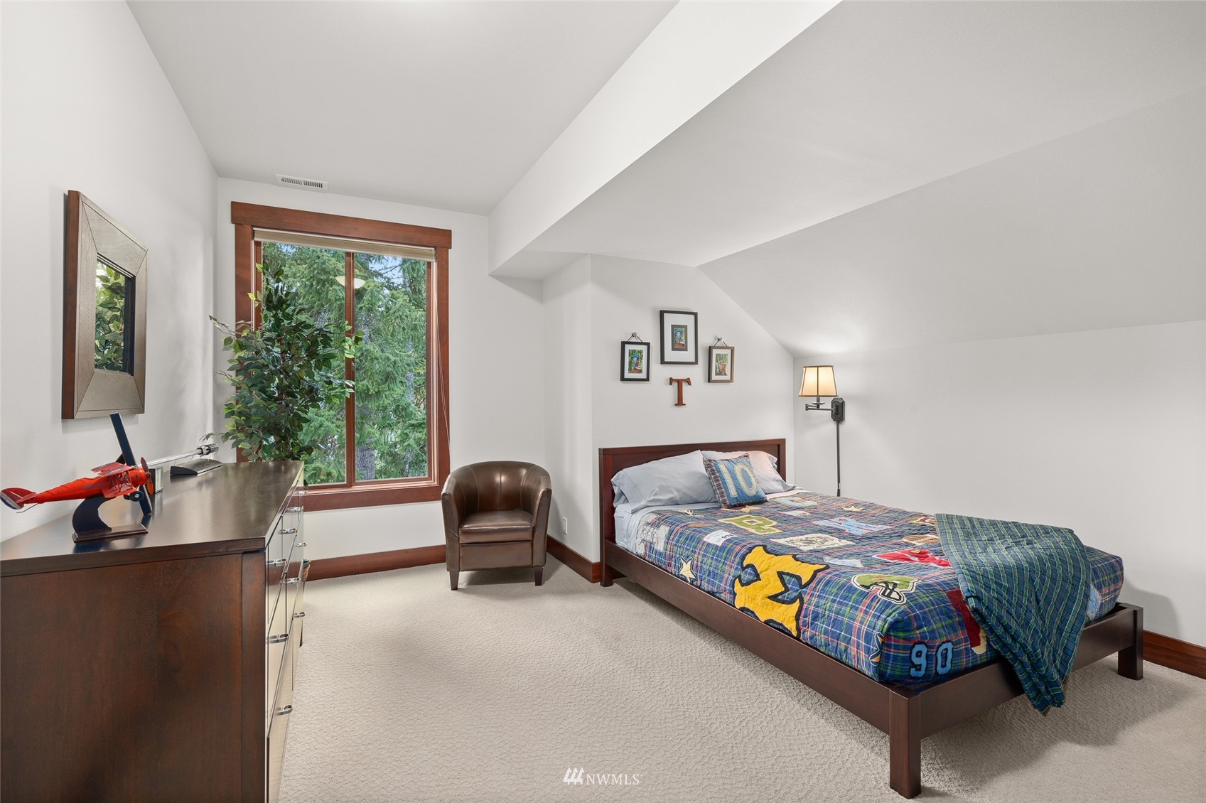 691 Kachess River Road Easton, WA 98925 - Photo 32 of 40 a bedroom with a bed and a couch