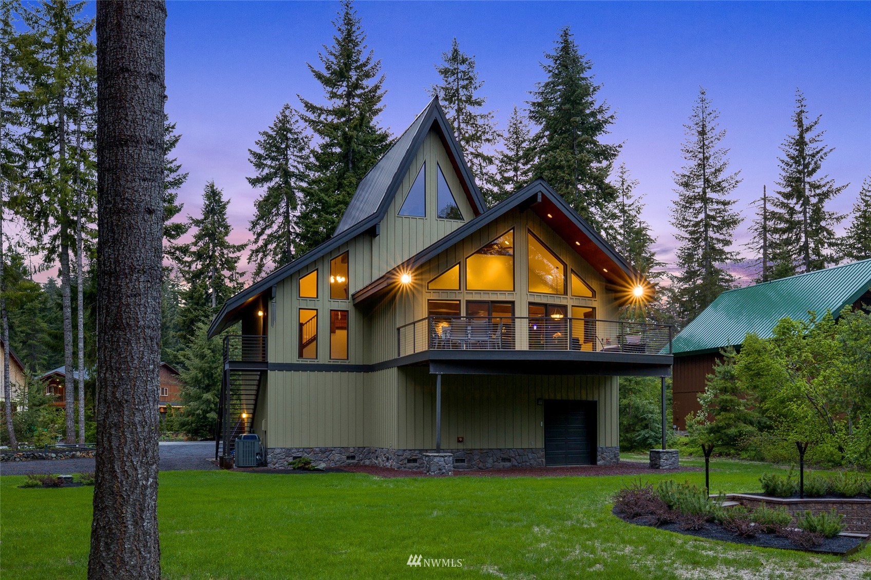 691 Kachess River Road Easton, WA 98925 - Photo 40 of 40 a view of a house with a yard and a garden