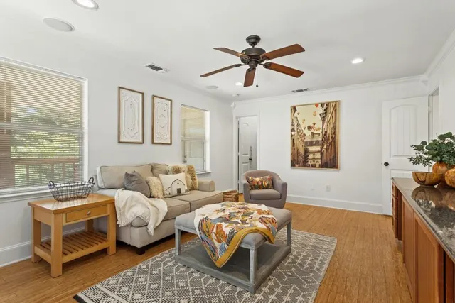 a living room with furniture and a window