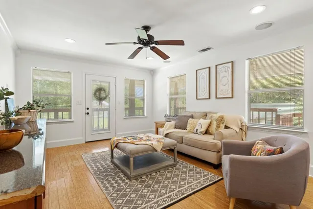 a living room with furniture and a window
