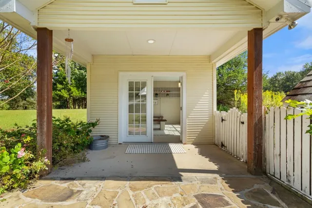 a view of a entryway door front of house