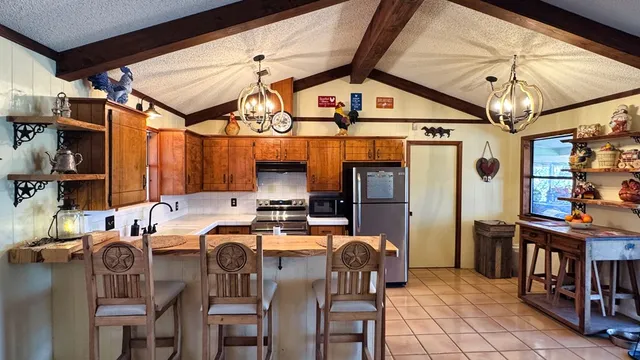 a view of a dining room with furniture