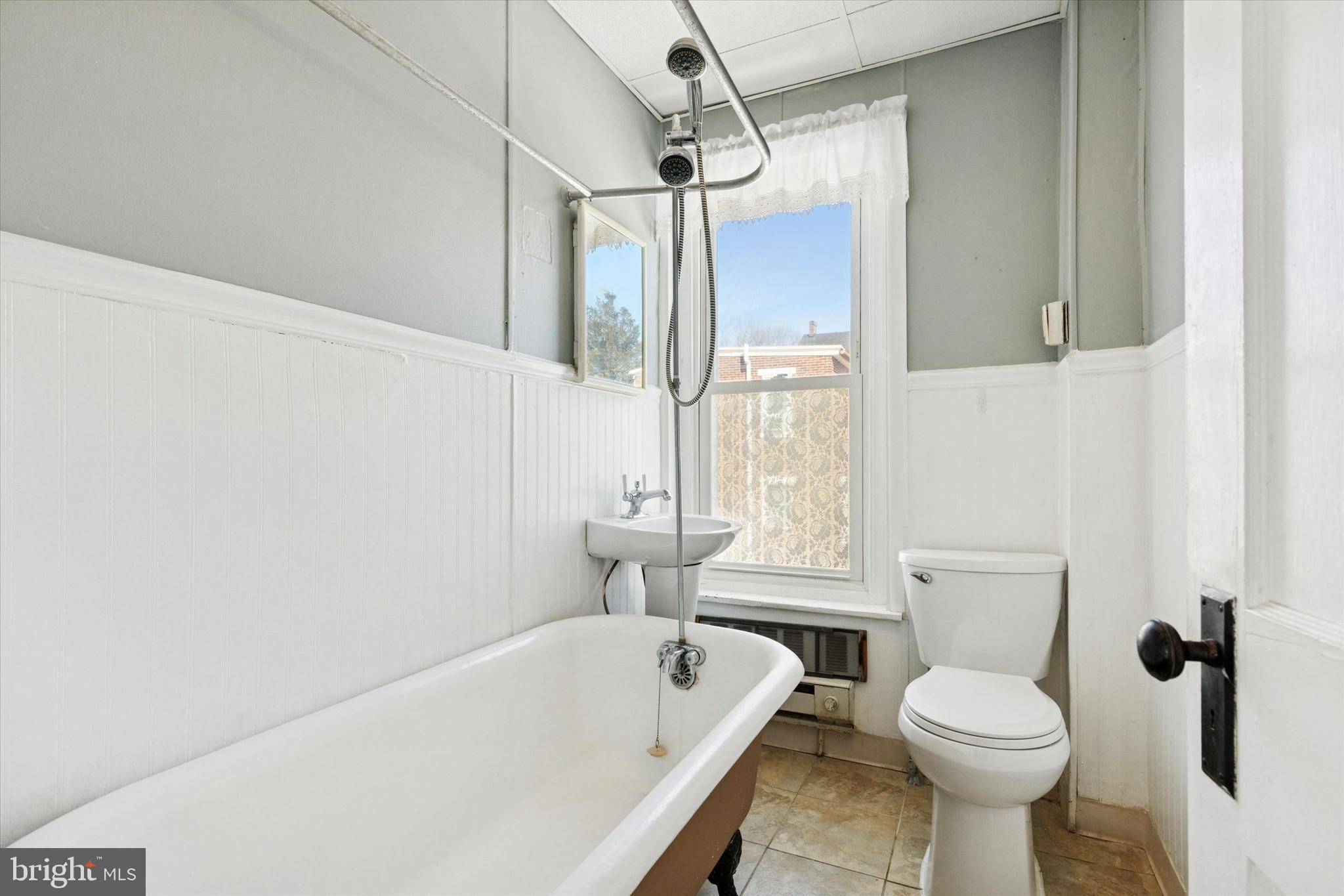 24 East 5th Street Pottstown, PA 19464 - Photo 11 of 15 a bathroom with a sink a toilet and shower