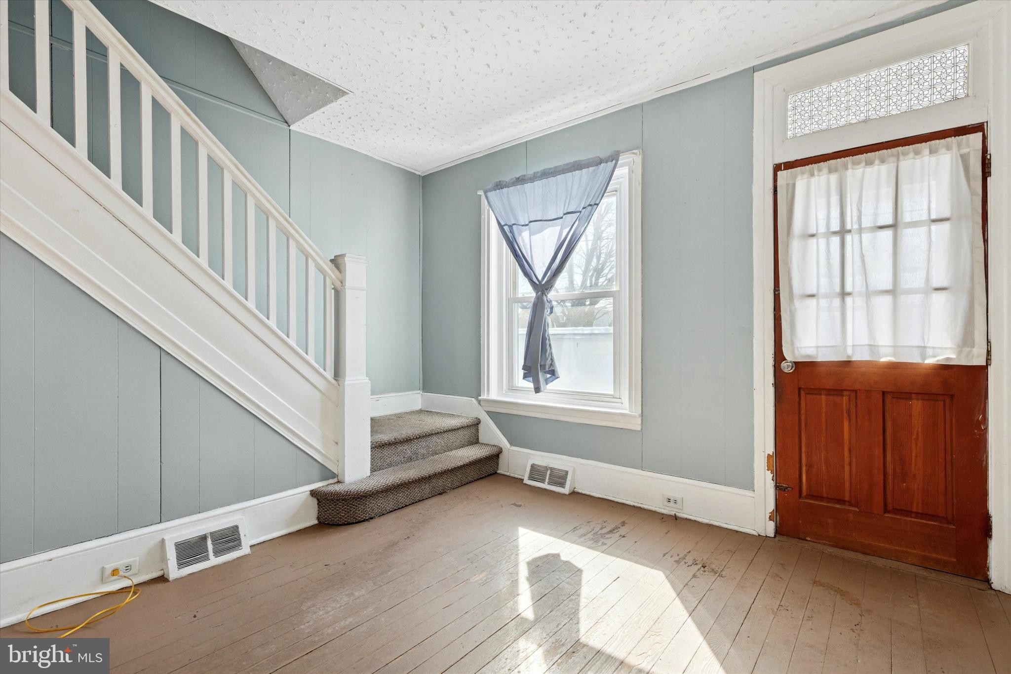 24 East 5th Street Pottstown, PA 19464 - Photo 3 of 15 a view of an entryway with staircase