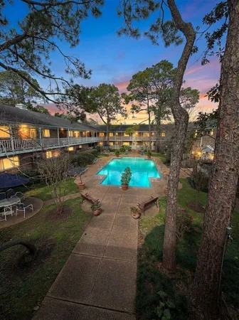 a view of a pathway with a yard